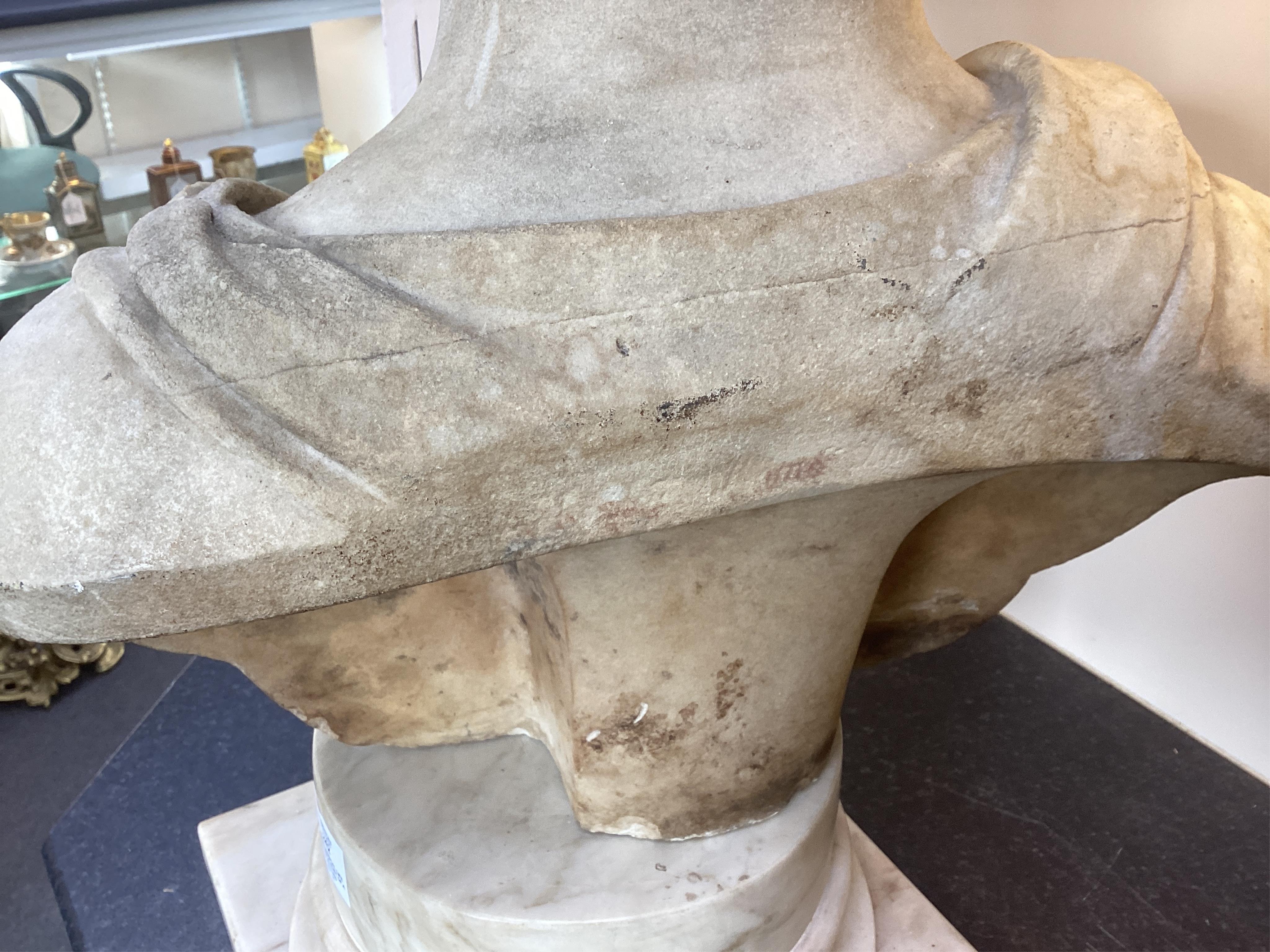 A neoclassical life size marble bust of a gentleman, early 19th century